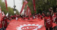 May Day marked with defiant rallies for worker rights