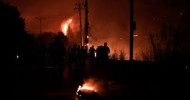 Thousands evacuated as wildfires rage near Athens