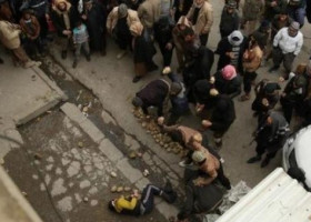 Islamic State stones a youth accused of homosexuality in Mosul:Photos