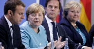 At Berlin summit, EU leaders vow to fight Trump on climate change