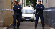 Australian police charge two men over plane bomb plot