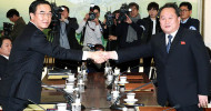 Two Koreas to march together in Olympics