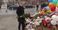 ‘One wants not to cry, but wail’: Putin visits scene of Kemerovo mall inferno (VIDEO)