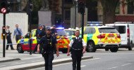Armed police arrest a man outside Parliament after a car crashed into security barriers, leaving two people  injured  By Rebecca Taylor, news reporter