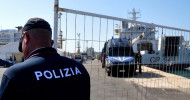 Four suspected people smugglers among migrants rescued by Italian coastguard