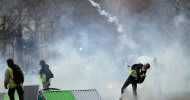 French police fire tear gas at protesters in central Paris Paris in lockdown as thousands of security personnel face another day of riots amid ‘yellow vest’ protests