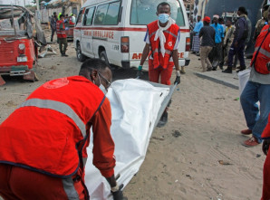 Four people killed, 10 wounded in bombing in Somali capital .Armed group al-Shabab claims responsibility for suicide bombing in a Mogadishu tea shop near a military base.
