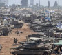 Israel masses troops around Rafah as US warns halting arms supply